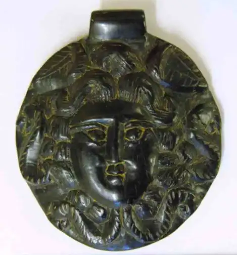 Close up of the medusa pendant