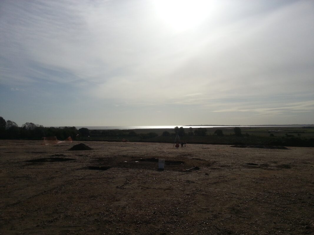 May be an image of 1 person, beach, twilight, fog and horizon